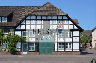 Wohnung kaufen in 37603 Holzminden, Wohnen mit Charme auf zwei Ebenen – Vermietete 3-Zimmer-Maisonettewohnung in der Innenstadt