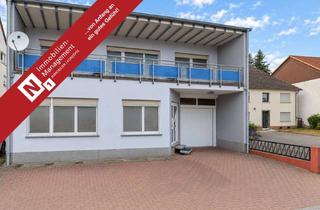 Haus kaufen in 66882 Hütschenhausen, Wohn- und Geschäftshaus oder Zweifamilienhaus mit Garten und Carport