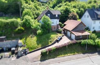 Einfamilienhaus kaufen in 35117 Münchhausen, Einfamilienhaus mit Freiraum und viel Potenzial in Münchhausen