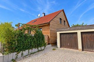 Haus kaufen in 92353 Postbauer-Heng, Platz für die ganze Familie: Modernisiertes Wohnhaus mit zwei Wohnebenen, Garten und Garagen in Postbauer-Heng – mit Wohnungsrecht
