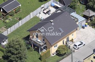 Einfamilienhaus kaufen in 09471 Königswalde, Modernes EFH mit Erdwärme, Wintergarten & großzügigen Terassen