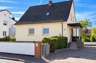 Haus kaufen in Am Kreuzweiher 15, 63526 Erlensee, Viel Raum zum Leben – familienfreundliches Zuhause mit Garten und besonderem Dachgeschoss in Erlense
