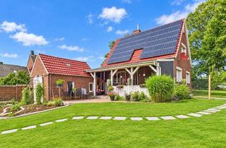 Haus kaufen in 26529 Osteel, Wärmepumpe & PV inklusive – charmantes Zuhause am Feldrand von Osteel