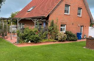 Einfamilienhaus kaufen in 26556 Westerholt, Westerholt - Einfamilienhaus mit Garten und Garage
