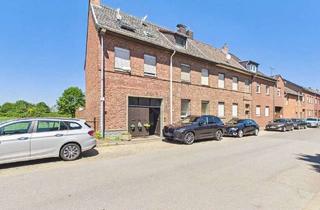 Mehrfamilienhaus kaufen in 52382 Niederzier, Solides Mehrfamilienhaus in dörflicher Lage von Niederzier-Hambach