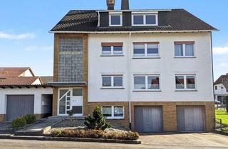 Mehrfamilienhaus kaufen in 34317 Habichtswald, Gepflegtes Mehrfamilienhaus mit insgesamt drei Wohneinheiten in Habichtswald