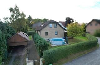Einfamilienhaus kaufen in 37699 Fürstenberg, Einfamilienhaus mit Einliegerwohnung, Süd-Garten und unverbaubarem Ausblick in Fürstenberg
