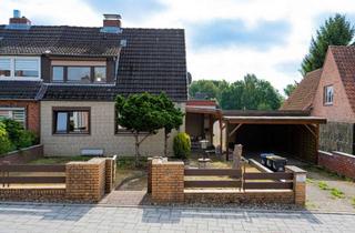 Doppelhaushälfte kaufen in 23617 Stockelsdorf, Doppelhaushälfte in ruhiger Lage in Stockelsdorf direkt am Landgraben