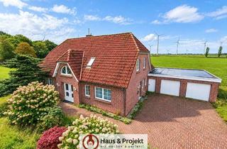 Haus kaufen in 26553 Dornum, Wohnen mit Weitblick nahe der Nordsee – 3 Wohneinheiten, Kamin und Doppelgarage