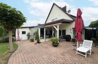 Haus kaufen in 25488 Holm, Großzügiges Wohnhaus mit Einliegerwohnung, Wintergarten, Sauna und schönem Garten
