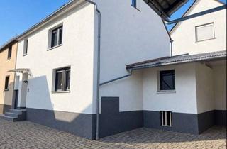 Doppelhaushälfte kaufen in 35447 Reiskirchen, Vermietete Doppelhaushälfte mit Anbau, Garagen & Werkstatt in Reiskirchen!