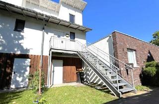 Wohnung kaufen in 25451 Quickborn, Appartment im Stil eines Reihenhauses in zentraler Wohnlage