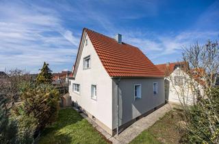 Einfamilienhaus kaufen in 91580 Petersaurach, Charmantes Einfamilienhaus mit liebevoll angelegtem Garten in ruhiger Lage