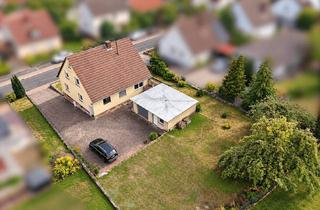 Einfamilienhaus kaufen in 97852 Schollbrunn, Ankommen. Wohlfühlen. Bleiben. – Einfamilienhaus mit viel Platz, Garten und Garage in Schollbrunn