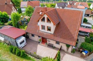 Haus kaufen in 90619 Trautskirchen, Viel Platz zum Leben: Flexibles Zweifamilienhaus mit optionaler Einliegerwohnung