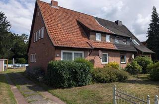 Doppelhaushälfte kaufen in 29313 Hambühren, Doppelhaushälfte mit großzügigem Grundstück - Sanierungsbedürftig! (MA-1020-324)
