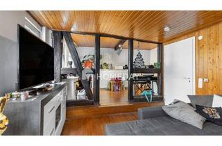 Haus kaufen in 65439 Flörsheim, Charmevolles Fachwerkhaus, Modernisiertes Bad, Idyllischer Innenhof und Ausbaureserve