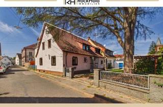 Einfamilienhaus kaufen in 76189 Daxlanden, Entspanntes Wohnen in Daxlanden: Einfamilienhaus mit Garten und zwei Garagen