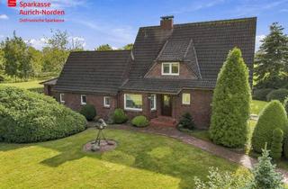 Einfamilienhaus kaufen in 26624 Südbrookmerland, Besonderes Einfamilienhaus mit parkähnlichem Grundstück und großzügigem Nebengebäude in Moordorf