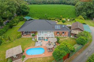 Haus kaufen in 27777 Ganderkesee, Ein Zuhause der besonderen Art - exklusiver Bungalow mit Pool und großzügigem, ruhigen Grundstück