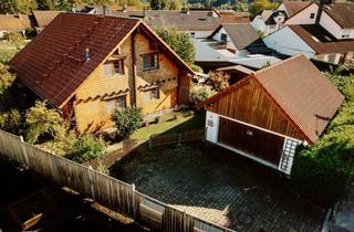 Haus kaufen in 85419 Mauern, Wohnen mit Charakter – gepflegtes Blockhaus mit großem Garten und Doppelgarage in Mauern