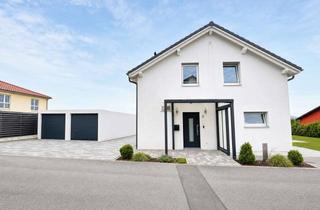 Einfamilienhaus kaufen in 97539 Wonfurt, Neuwertiges Einfamilienhaus mit großem Garten, Terrasse und drei Garagen in Steinsfeld bei Haßfurt