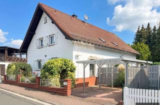 Haus kaufen in 61250 Usingen, Freistehendes Zweifamilienhaus in Usingen