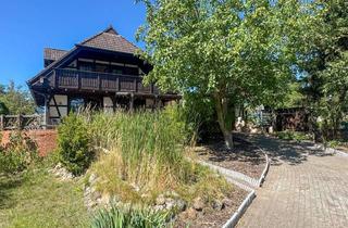 Haus kaufen in 16259 Bad Freienwalde, Fachwerkhaus am Wasser mit Dachterrasse und großem Garten