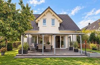 Einfamilienhaus kaufen in 33378 Rheda-Wiedenbrück, Modernes Einfamilienhaus mit Terrasse, Garten und EEK D in Rheda-Wiedenbrück