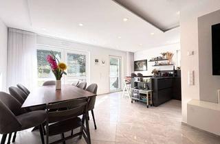 Wohnung kaufen in 71729 Erdmannhausen, Exklusive Gartenwohnung mit Südterrasse und hochwertiger Ausstattung