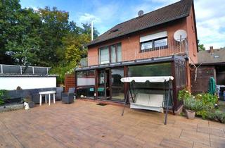 Wohnung kaufen in 46483 Wesel, Wohnen mit vielen Möglichkeiten – Erdgeschosswohnung mit Garten, Wintergarten & Garage!