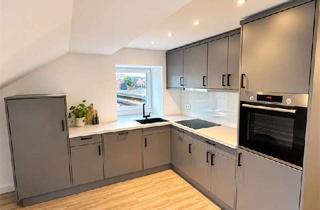 Wohnung mieten in 21423 Winsen, Großzügige 2 Zimmer-Dachgeschosswohnung mit offener Küche in zentraler Lage von Winsen