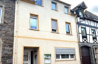 Mehrfamilienhaus kaufen in 56850 Enkirch, Enkrich - Renite von rd. 8,5 % möglich Mehrfamilienhaus (3 Wohnungen) in Enkirch an der Mosel mit Sonnenterrasse