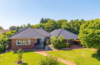Haus kaufen in 26810 Westoverledingen, Bungalow mit großzügigem Grundstück, Einliegerwohnung Werkstatt und Carport in Großwolderfeld