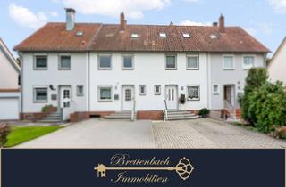 Reihenhaus kaufen in 26919 Brake, Viel Platz auf mehreren Ebenen: Reihenhaus mit Balkon und Garten