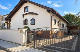 Einfamilienhaus kaufen in 61184 Karben, Familienfreundliches Einfamilienhaus mit schönem Garten in Karben