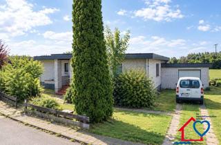 Haus kaufen in 24616 Hasenkrug, Bungalow mit Einliegerwohnung in ruhiger Sackgassen- und Feldrandlage