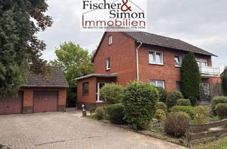 Haus kaufen in 31629 Estorf, Estorf-gepflegtes Zweifamilienhaus auf großem Grundstück mit Mieteinnahme - EG frei für Eigennutzung