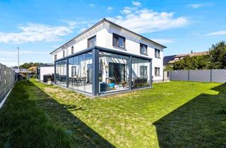 Doppelhaushälfte kaufen in 85114 Buxheim, Neuwertige Doppelhaushälfte mit 219 m², Wintergarten & Energieklasse A+