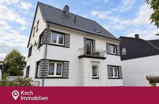 Anlageobjekt in 52531 Übach-Palenberg, Mehrfamilienhaus mit drei Wohneinheiten und vier Garagen in Übach-Palenberg zu verkaufen!