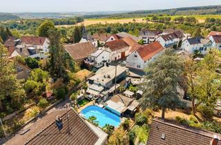 Haus kaufen in 55444 Eckenroth, Familienfreundliches Zuhause mit Pool,Sauna & Bauland