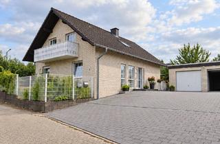 Haus kaufen in 32584 Löhne, Großzügiges Wohnhaus mit Baugrundstück