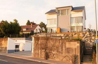 Wohnung kaufen in 55126 Finthen, Moderne 3-Zimmerwohnung (Bj. 2015) 18 m² Terrasse, Aufzug & Tiefgarage in Feldrandlage Mainz-Finthen