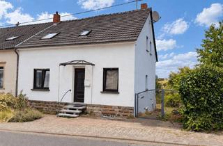 Haus kaufen in 66346 Püttlingen, Einseitig angebautes Haus mit Panorama-Wintergarten und zusätzlichem Grundstück