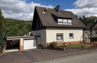 Einfamilienhaus kaufen in 53426 Schalkenbach, Großzügiges Einfamilienhaus mit 2 Garagen und schönem Grundstück