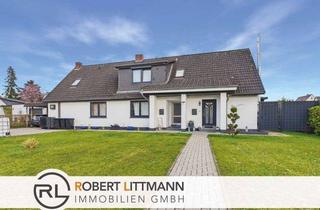 Haus kaufen in 27729 Hambergen, Zweifamilienhaus mit großem Garten und Wärmepumpe in Hambergen