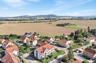 Wohnung kaufen in 02692 Doberschau, Liebevoll sanierte 2,5-Zimmerwohnung mit Terrasse und EBK in der schönen Oberlausitz