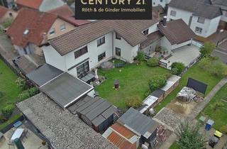Wohnung kaufen in 35457 Lollar, Großzügiges Wohnen mit Garten