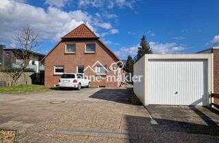 Haus kaufen in 31582 Nienburg, Seltene Gelegenheit in Holtorf: Großzügiges Zweifamilienhaus mit Terrasse und Garage