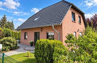 Einfamilienhaus kaufen in Harsefelder Straße 22, 17258 Feldberger Seenlandschaft, Hochwertiges Einfamilienhaus mit großzügigem Garagenkomplex – stilvolles Wohnen in Feldberg